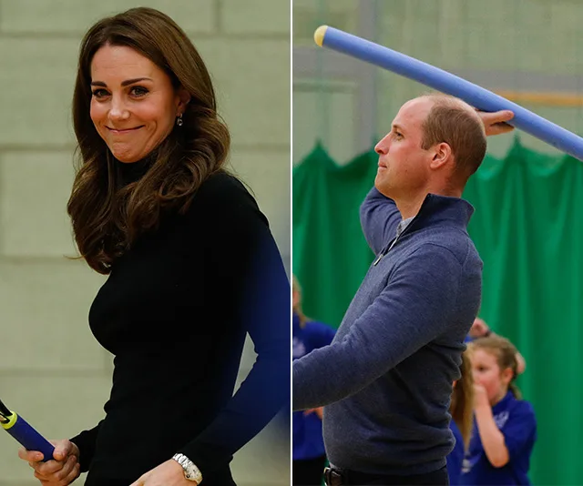 Kate Middleton and Prince William engaging in a sports activity with foam bats indoors.
