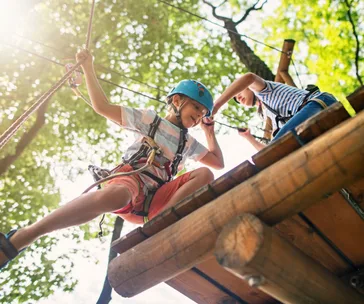 School camp checklist. Children on high ropes course.