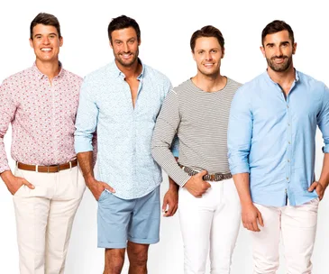 Four men from "The Bachelorette Australia" smiling, wearing casual shirts and pants, standing against a white background.