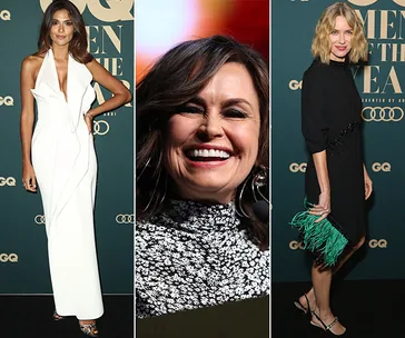 Three women at the 2018 GQ Men of the Year Awards red carpet in elegant outfits, smiling for the camera.