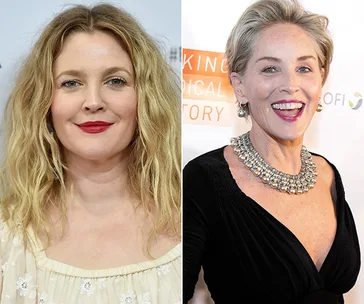 Two smiling women, one with blonde curly hair and red lipstick, the other in a black dress and silver necklace.