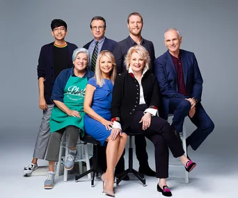 The cast of the "Murphy Brown" revival, including an older woman in a black blazer, posing in a studio setting.