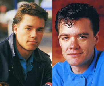 Young men in 90s fashion, possibly from TV show "Neighbours," wearing blue shirts; one in a jacket.