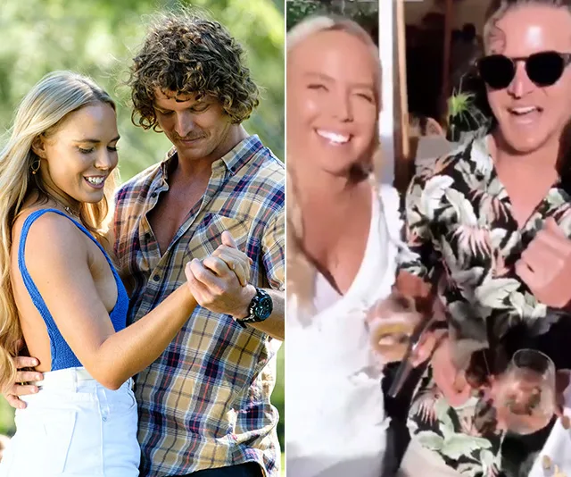 Couple dancing in outdoor setting, smiling couple holding drinks at a party.