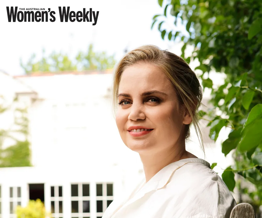 A woman with blonde hair, smiling outdoors, featured in The Australian Women's Weekly.