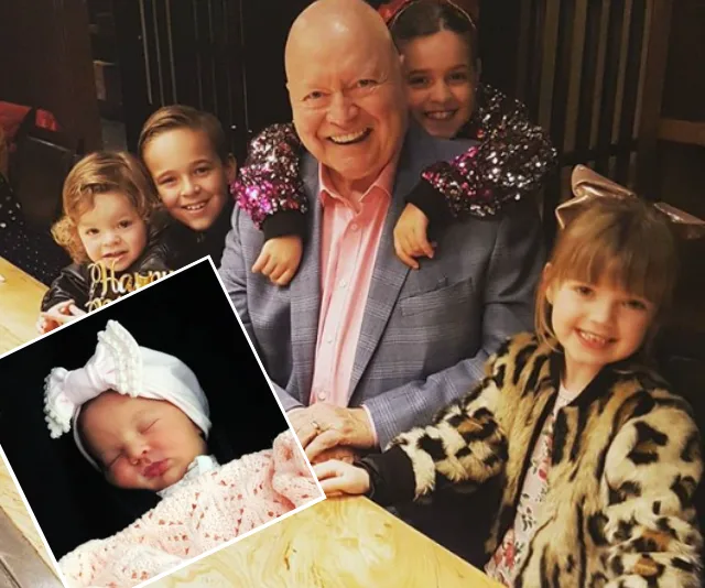 Bert Newton smiling with his grandchildren; inset shows a sleeping newborn in a white headband.