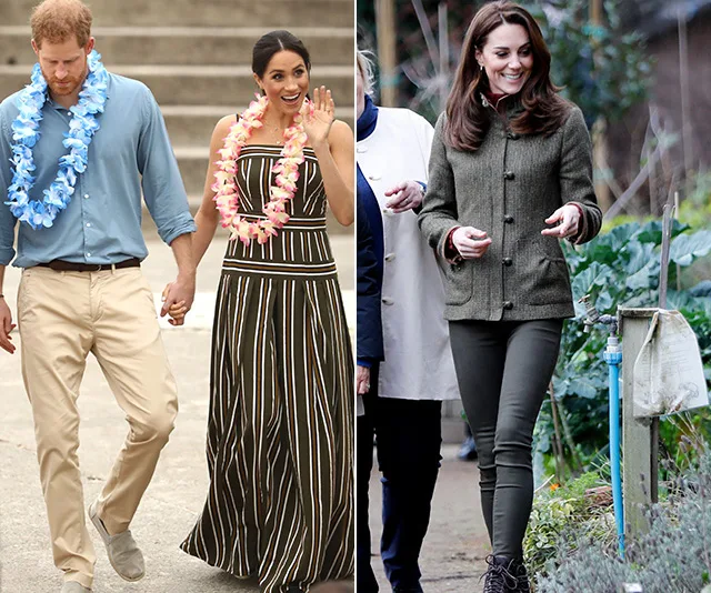 Couple with leis walking; woman in striped dress, man in blue shirt. Woman in jacket walking in garden.