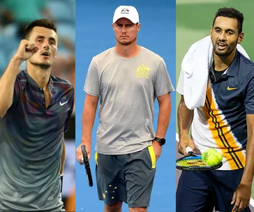 Australian tennis players on the court, each holding or near tennis gear.