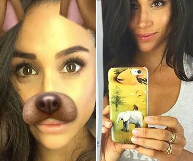 A woman with a Snapchat dog filter and holding a phone with an elephant case, taking a selfie in a mirror.