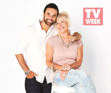 Two smiling people pose together; one stands, and the other sits. A "TV WEEK" logo is visible.