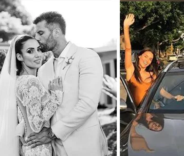 Couple in wedding attire with the groom kissing the bride and a woman waving from a car.