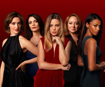 Five women in elegant dresses pose confidently against a dark red background.