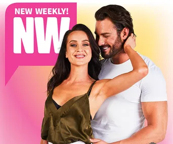 Couple posing happily in front of a "New Weekly" magazine cover.