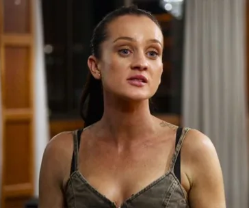 Ines from "Married at First Sight" speaking, wearing a sleeveless top, with an expression of concern in a room setting.