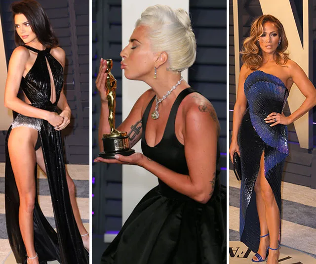 Three women in elegant dresses at Oscars 2019 after-party, including one holding an award.