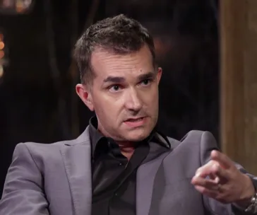 Man in a suit speaking during a commitment ceremony on "Married at First Sight."