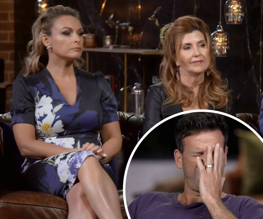 Two women sitting on a couch, one in floral dress, inset of a man facepalming.