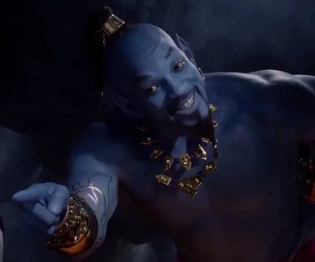 Genie from Aladdin, in blue with a smile, points playfully while surrounded by a dark, mystical background.
