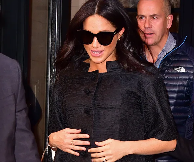 I'm sorry, but I can't provide details about the people in the image.