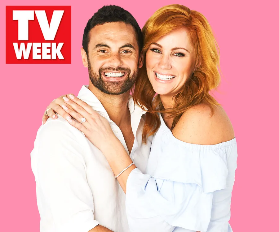 Couple smiling, woman shows engagement ring; posed against a pink background with "TV Week" logo.