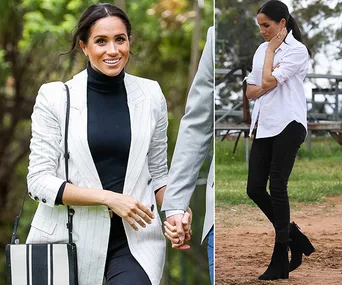 A woman in smart casual outfits, wearing a striped blazer and a white shirt, in an outdoor setting.