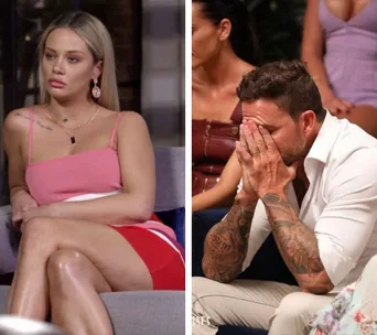 Two individuals sitting; one woman looks pensive, the other man covers his face with hands in apparent distress.