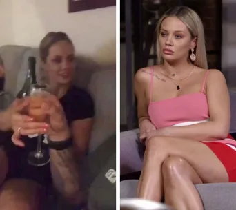 Two women sitting; left with a drink, right in a pink dress looking serious.