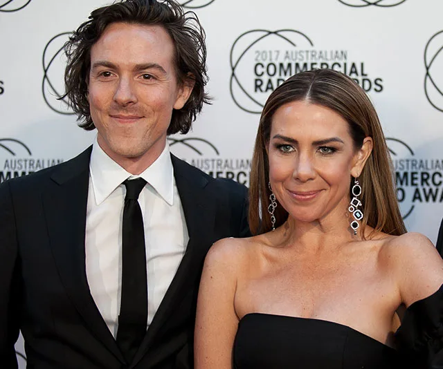 Two individuals in formal attire at the 2017 Australian Commercial Radio Awards event backdrop.