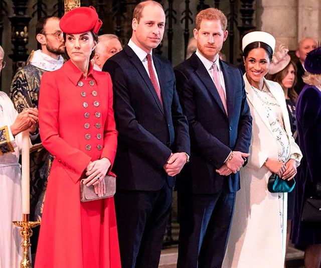 Royal family members attending a formal event; women wear red and white coats, men in dark suits.