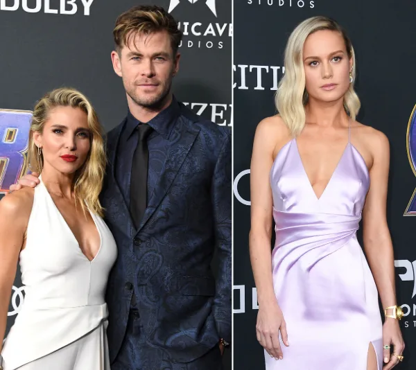 Couple poses on the left, with a woman in a white dress and man in a suit; woman in lavender dress on the right.