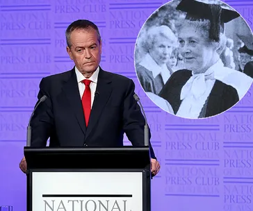 Speech at National Press Club, inset of woman in academic gown.