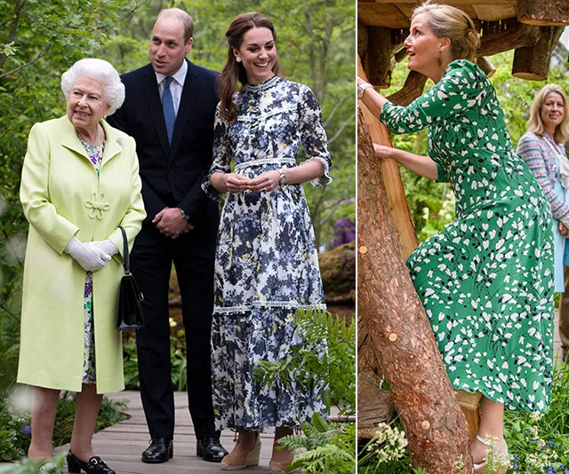 Royal family members walking in a garden at the Chelsea Flower Show.