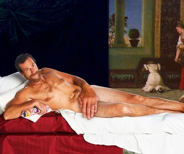 A man with a beard poses reclined on a bed, holding a can, against a classical painting backdrop.