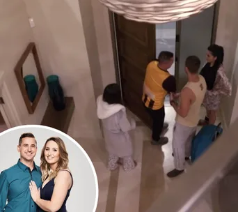 Participants gather near the doorway in a house, with an inset of a couple posing together.