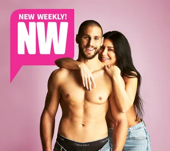 A smiling woman hugs a shirtless man from behind; "NEW WEEKLY! NW" text on a pink background.