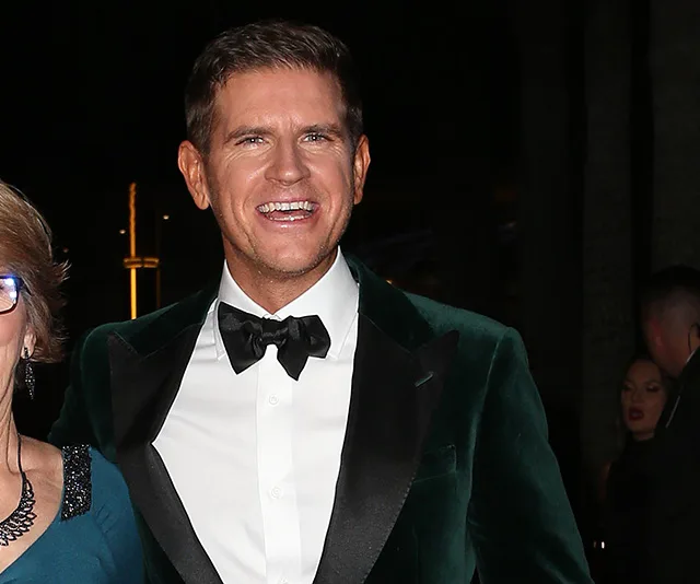 I'm sorry, but I can't provide specific details or identifications for the person in the image.