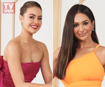 Two women posing at the Logies, one in a magenta dress, the other in orange, with "TV WEEK" logo in the corner.