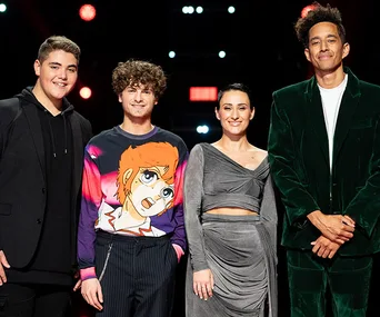 Four finalists from The Voice Australia 2019 posing on stage, including winner Diana Rouvas.