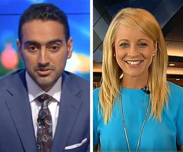 Two news anchors, one in a blue suit speaking, and one in a blue dress smiling at the camera.