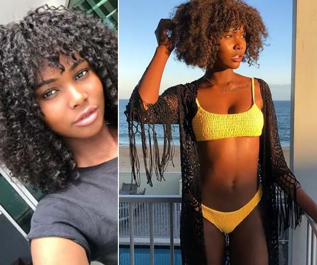 Vakoo Kauapirura from The Bachelor 2019 in a yellow bikini and black cover-up by the beach.