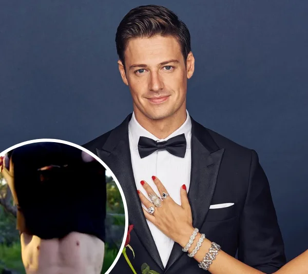 Man in a tuxedo with a bow tie, woman's hand adorned with jewelry rests on his chest, inset shows a cropped shirtless torso.