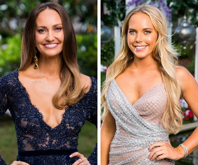 Two women smiling, one in a navy sequin dress and the other in a silver gown, standing outdoors.