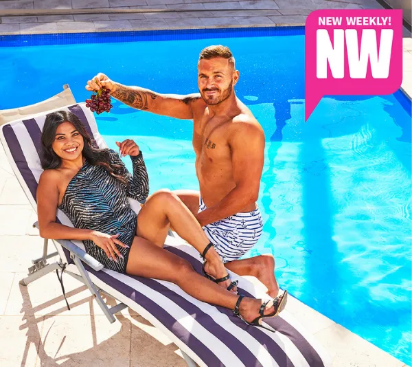 Two people lounging by a pool on striped chairs. The man holds grapes. Logo reads "New Weekly! NW" in a pink speech bubble.