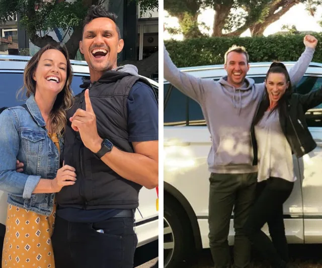 Couples celebrate in front of a car, smiling and waving joyfully.