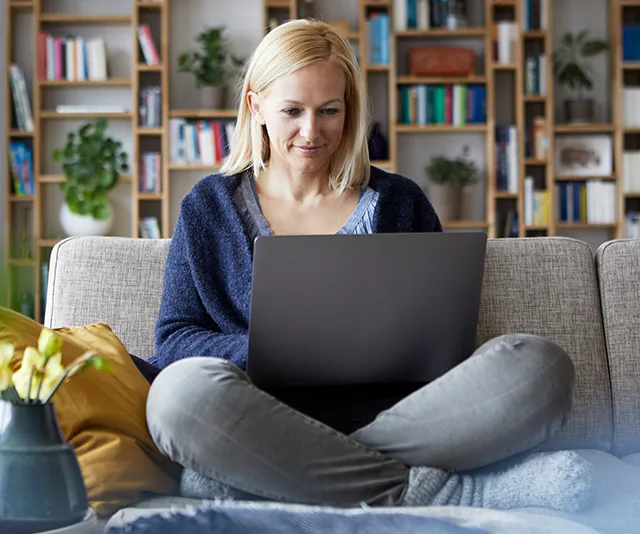 Blonde woman on laptop