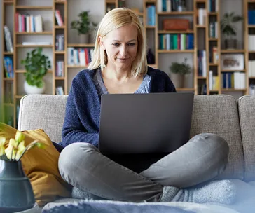 Blonde woman on laptop 