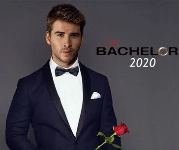 Liam Hemsworth in a tuxedo holding a red rose, promoting "The Bachelor 2020".