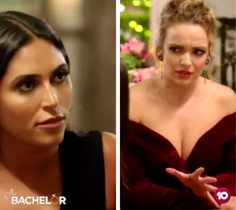 Two women from The Bachelor 2019, engaged in a tense discussion. One looks serious, the other appears concerned.