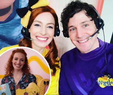 Emma Watkins and Lachy Gillespie in Wiggles outfits, smiling with headsets; insert of Emma with Spot the dog book.