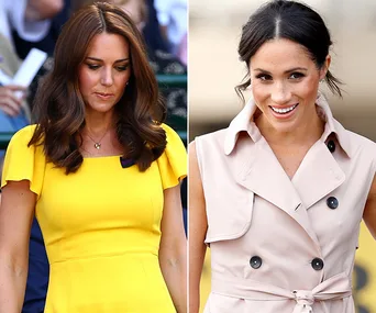 Two women, one in a yellow dress and another in a light pink outfit, standing side by side, smiling.